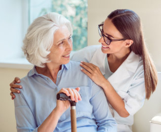 a female caregiver with an elderly woman